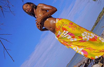 Tierra in Oiled ebony posing at the shore from Domai