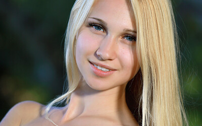 Sensual outdoor striptease with amazing blonde beauty Belonika