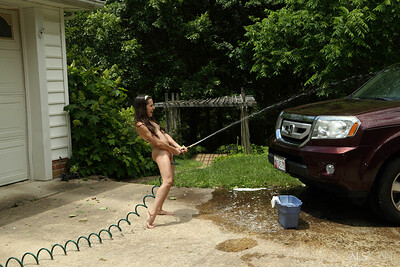 Freya Von Doom gets so horny while washing her car she has to play with her pussy as well