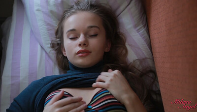 Lonely brunette beauty is in the train cabin feeling horny