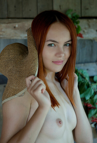 Sensual redhead babe Shaya takes off her dress to show us her luscious natural body