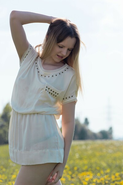 Monica in Flower field from Fame Girls