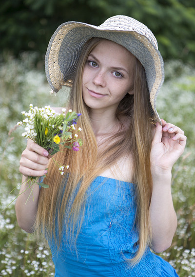 Nastyshka in Bed Of Flowers from Showy Beauty