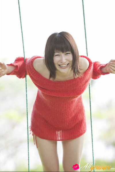 Flirty and playful charmer Mari Okamoto displays her marvelous curves