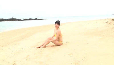 Adorable and playful vixen Risa Mitadera bares her gorgeous body