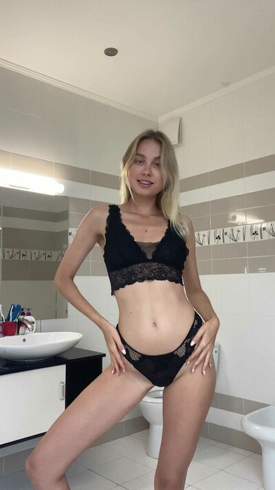 Sophia Blum playfully presenting her athletic body wrapped in sexy lingerie