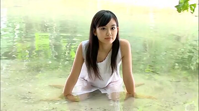 Have a nice time on the beach with small titted Asian girl Yui Ito