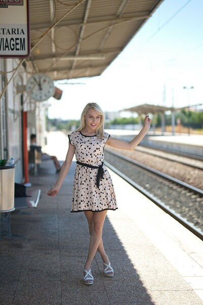 Naughty blonde Chloe Toy flashing her panties at the train station