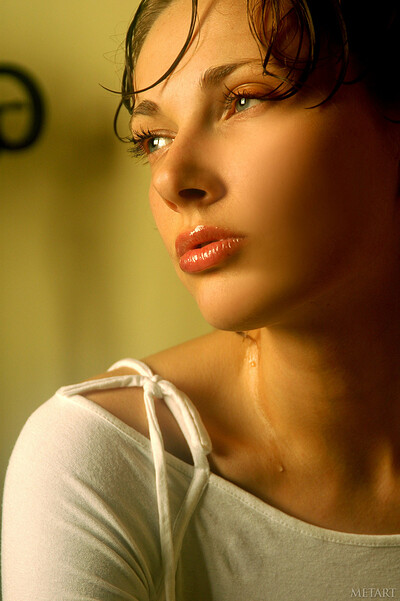 Delicate short-haired brunette flashing her nipples in a white top