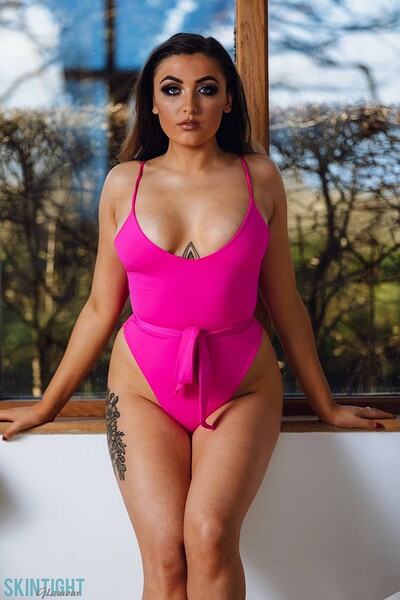 Blossom May in Wicked Window from Skintight Glamour