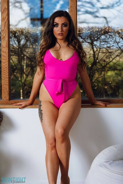 Blossom May in Wicked Window from Skintight Glamour