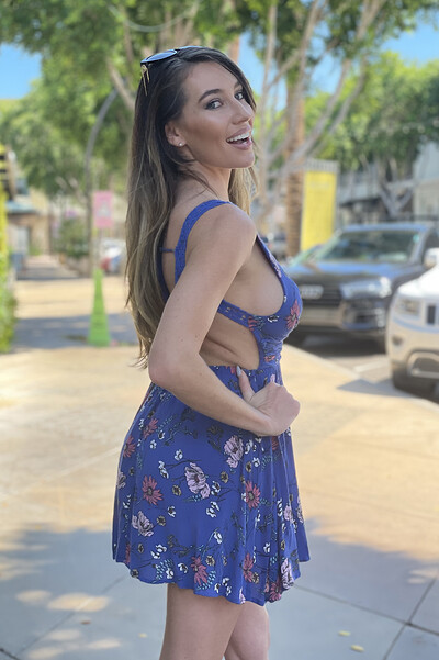 Gorgeous ftv beauty Raye playfully poses in public while wearing a flowery dress