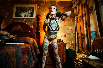 Anna Monoxide showcases her slender sculpture with lots of tattoos and tiny breasts while stripping down her clothes