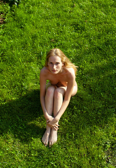 Leona in Rest on the grass from Stunning 18