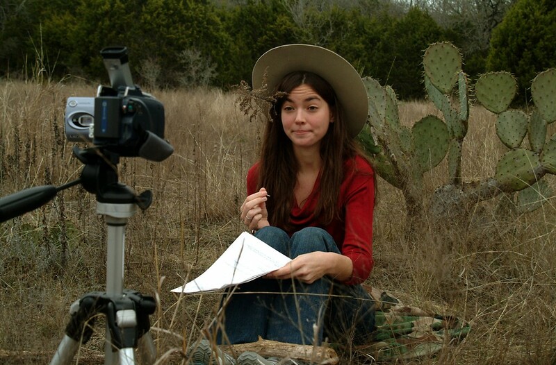 Josie's taking pictures in the desert and trying to entertain herself