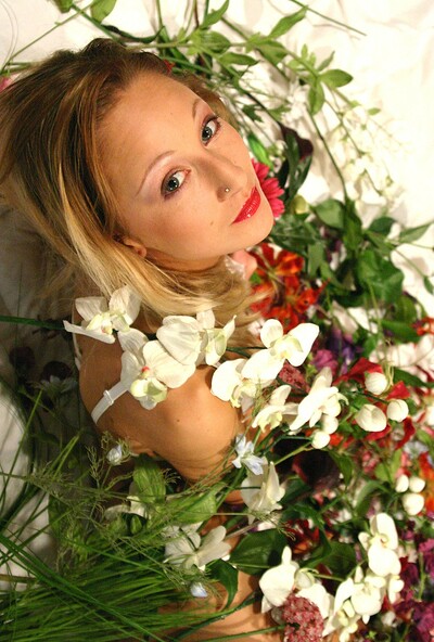 Viktoria loves flowers and she often poses naked with them