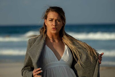Elly in Black Rocks from Nude Muse