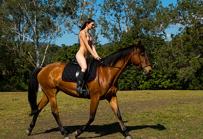 Angela in Nude Horse Riding from Nude Muse