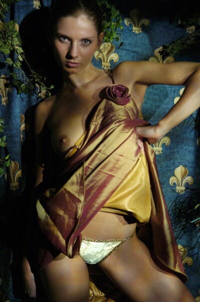 Before showering the breathtaking brunette slathers shampoo all over her soft skin