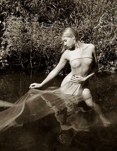 As the river flows so too does Caroline's pussy opens