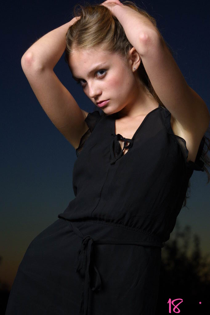 Helena in 18 Magazine set Green dress