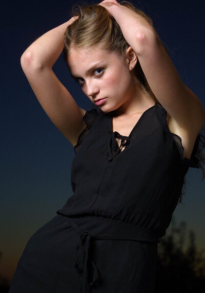 Helena in 18 Magazine set Green dress