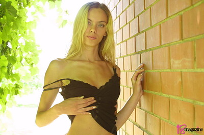 Sofia in Brick wall from 18 Magazine