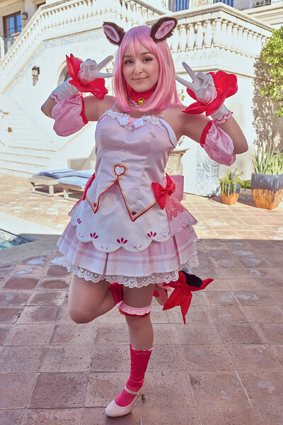 Pink-haired hottie exhibits her juicy ass under her fury cosplay as she takes it in her pink minge