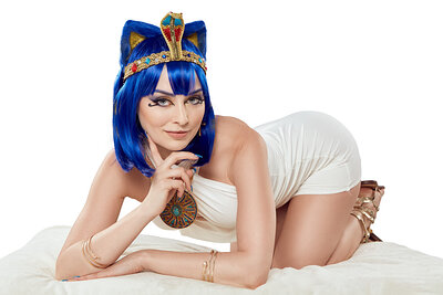 Blue-haired seductress Jewelz Blu looks like a goddess in her cosplay as she pops out her juicy breasts and takes a rod from behind