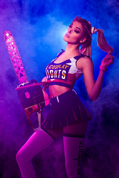 Pigtails wearing stunner looks alluring while cosplaying Lollipop Chainsaw and exhibiting her body with perfect boobs
