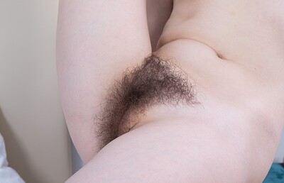 Kira Stone in We Are Hairy set Kira Stone enjoys her naughty tablet in bed