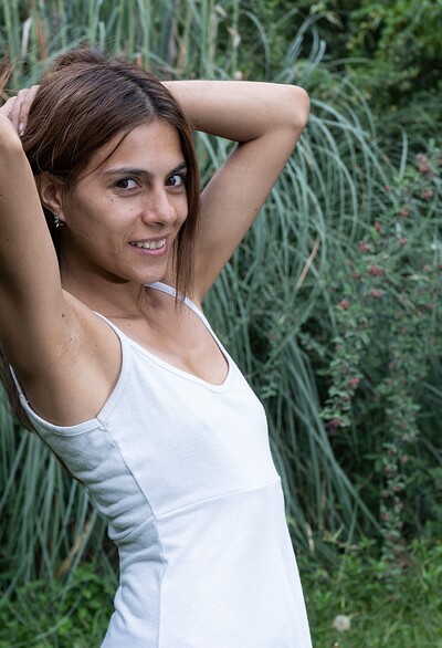 Alice Mad in Alice Mad strips naked on her outdoor lawn from We Are Hairy
