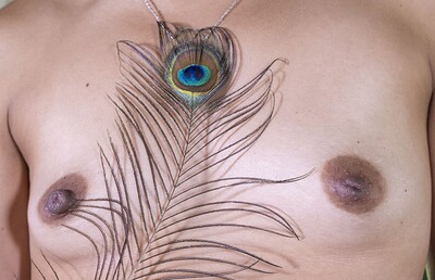 Margaret in Margaret Li enjoys her sensual peacock feather from We Are Hairy