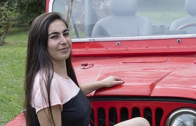 Paris in Paris poses naked outdoors by her red jeep from We Are Hairy