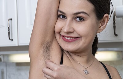 Eva Black in Eva Black strips naked while making dinner from We Are Hairy