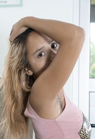 Clarita in Clarita strips naked with a smile in her kitchen from We Are Hairy