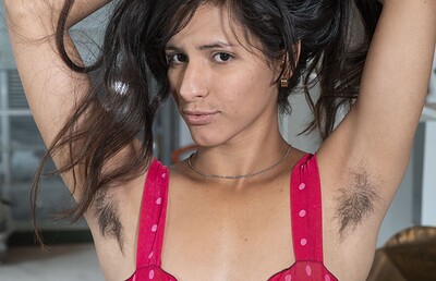 Pamela in Pamela poses naked on some motorcycles from We Are Hairy