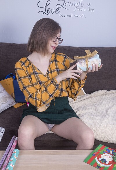 Abby in Abby gets naked during gift wrapping from We Are Hairy