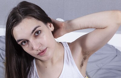 Milena Juice in Milena Juice strips naked after reading a book from We Are Hairy