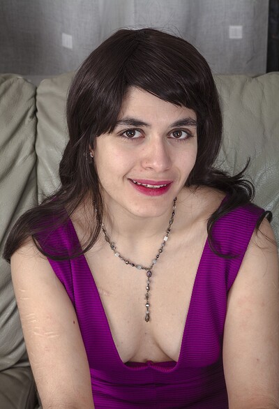 Lilly Scabette in Lilly Scabette poses in her sexy purple dress from We Are Hairy