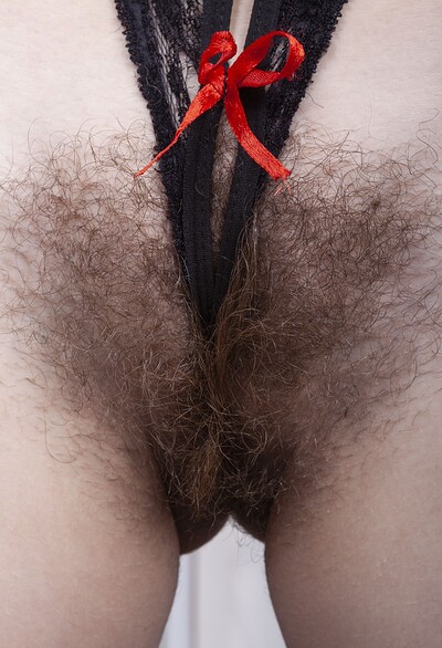 Sharon Rosie in Sharon Rosie masturbates with her purple toy from We Are Hairy