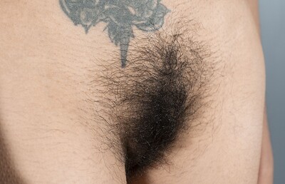Pamela in Pamela strips naked in her garage from We Are Hairy