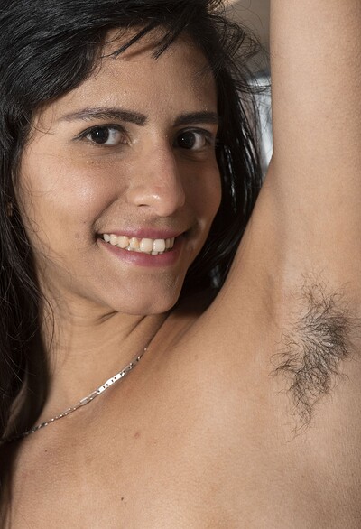 Pamela in Pamela strips naked in her garage from We Are Hairy