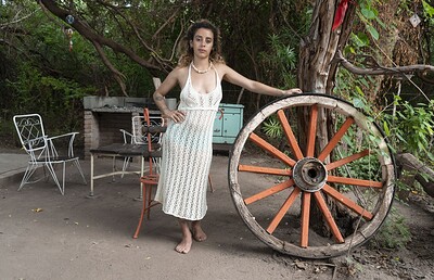 Lula in Lula strips naked outside by her wooden wheel from We Are Hairy
