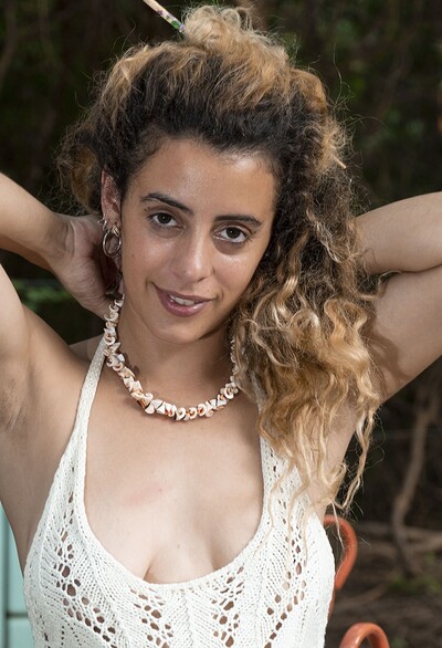 Lula in Lula strips naked outside by her wooden wheel from We Are Hairy