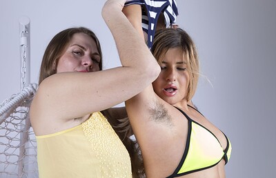 Lika Luna and Bossaia Golloia in Bossaia Golloia and Lika Luna fuck by her chair from We Are Hairy