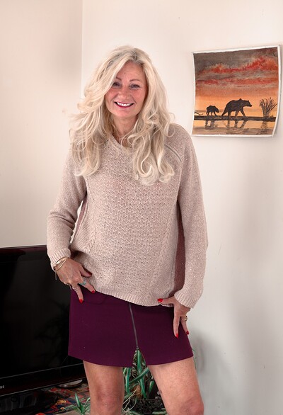 Ellen in Ellen B poses in her ever short purple skirt from We Are Hairy