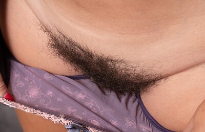 Gadget in Gadget strips nude to masturbate on her sofa from We Are Hairy