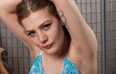 Emma Frost in Emma Frost strips off her white lingerie to play from We Are Hairy