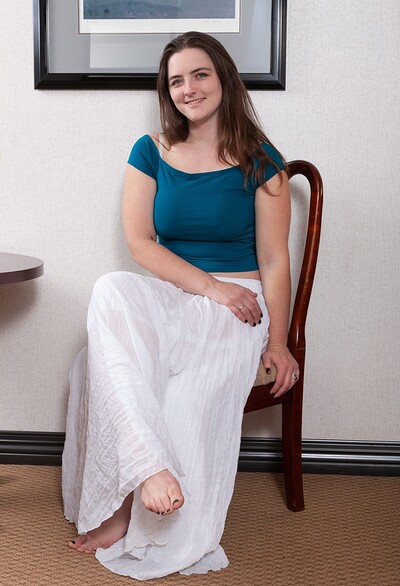 Raven Snow in Snow strips naked while sitting in her chair from We Are Hairy